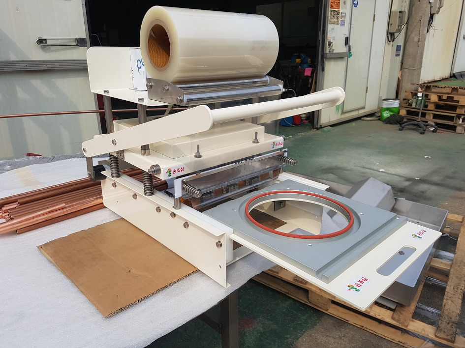 10-수동식실링기-트리밍절단[실용신안출원 제20-2017-0000742호]-중화요리용기.jpg